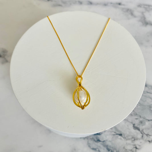 Secret door gold pendant with pearl