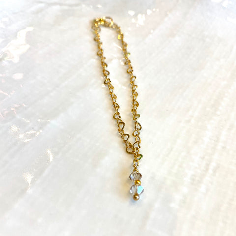 Gold plated sterling silver charm style bracelet with Swarovski crystal elements