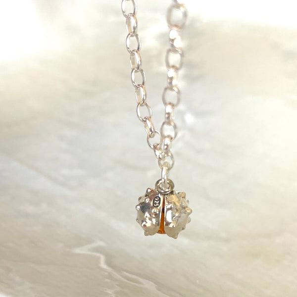 Sterling silver amber conker bracelet