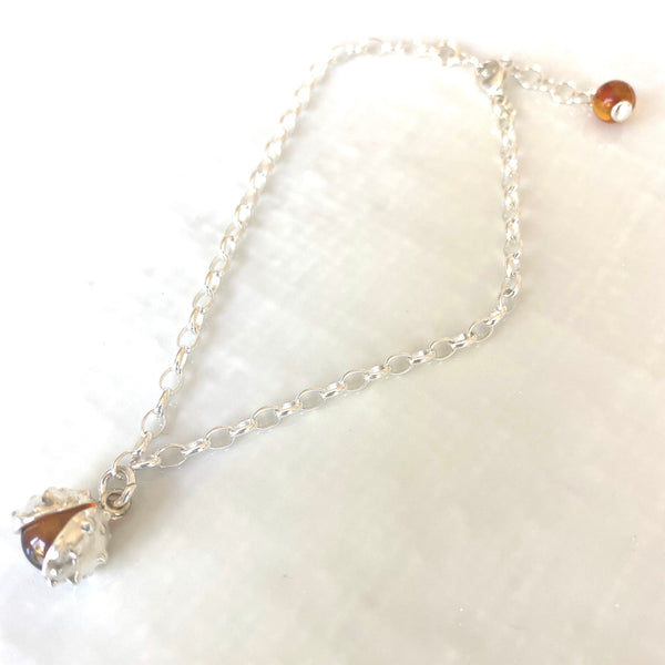 Sterling silver amber conker bracelet