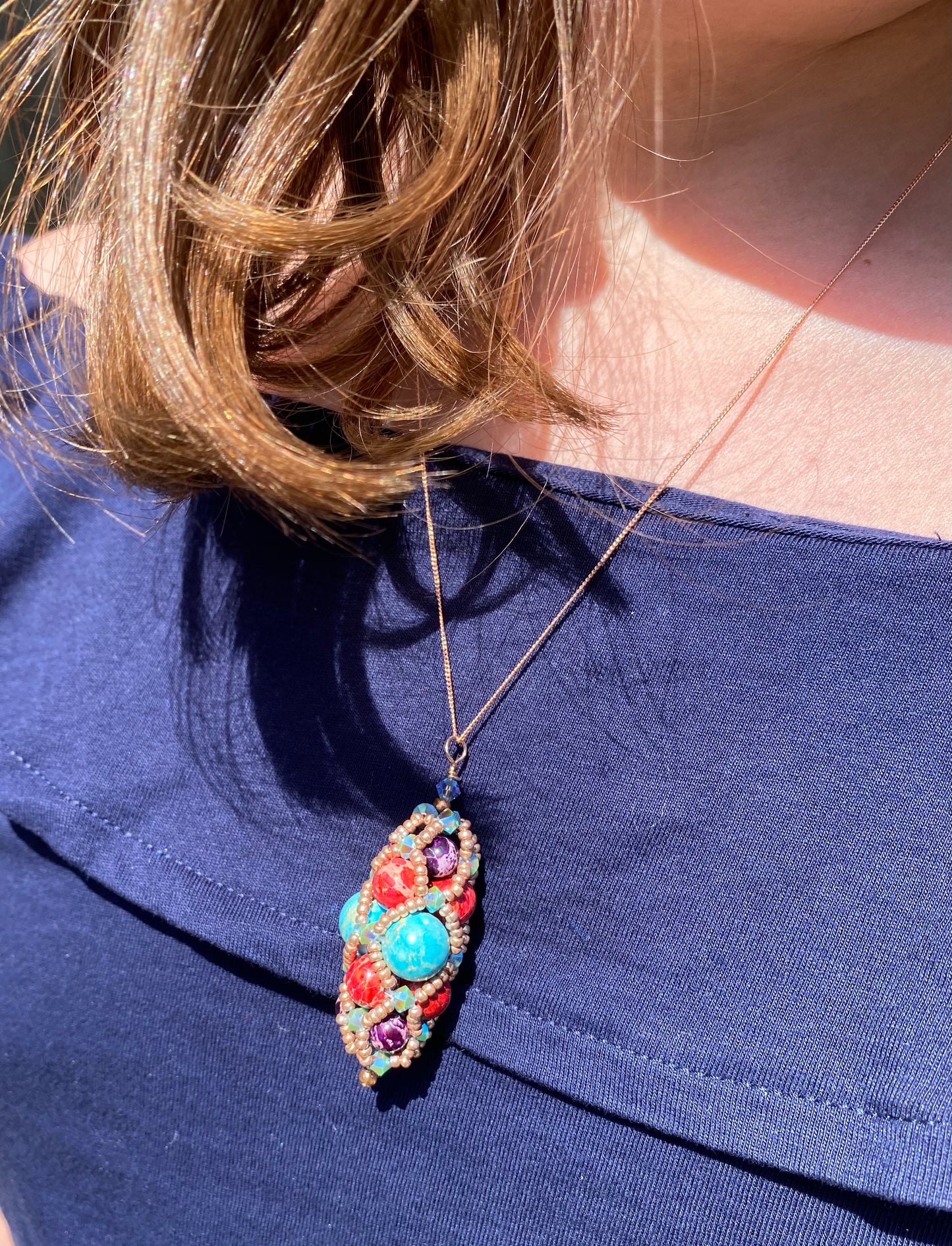 Renaissance style hand beaded pendants