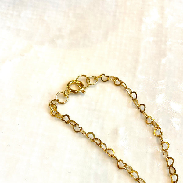 Gold plated sterling silver charm style bracelet with Swarovski crystal elements