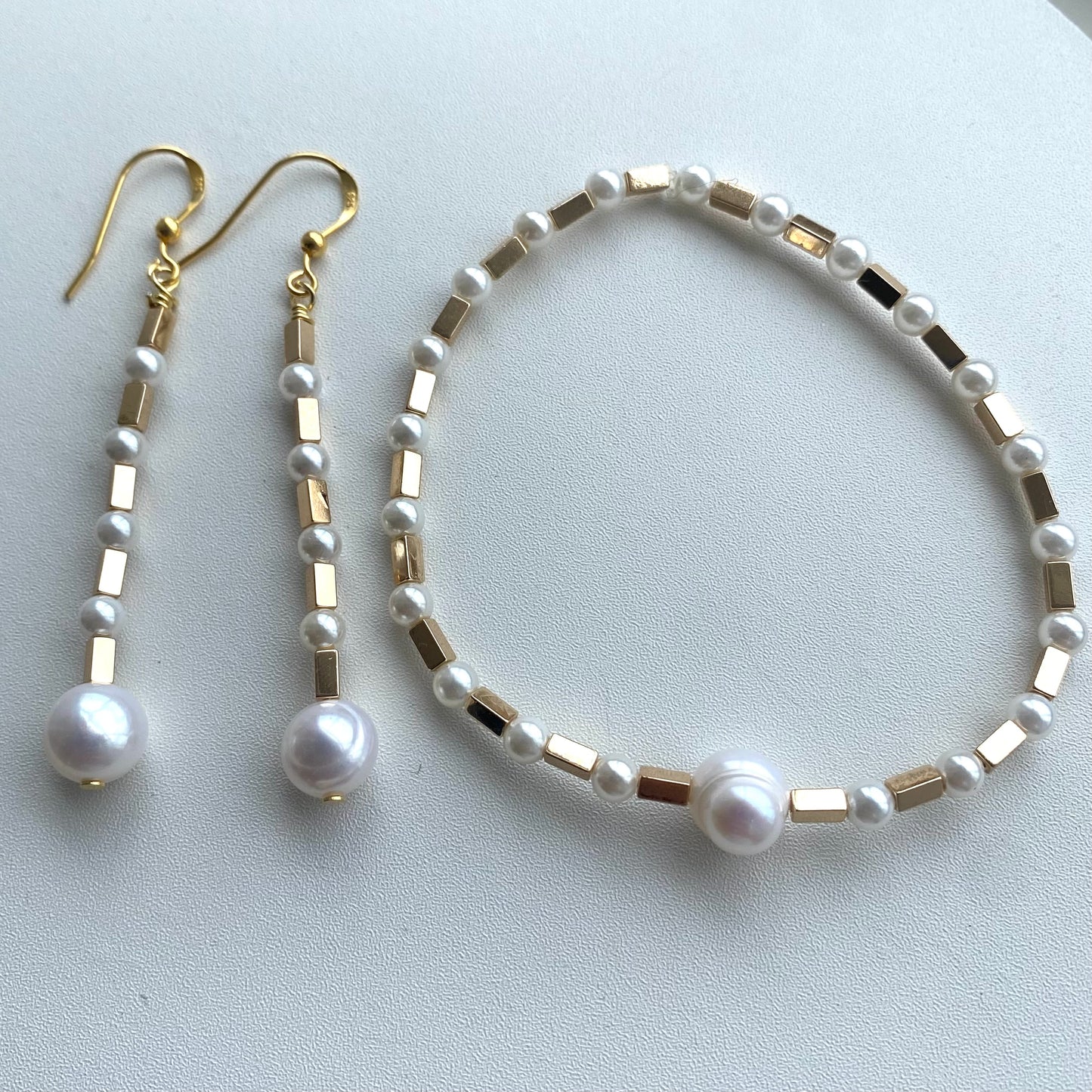 Pearl and gold hematite earrings