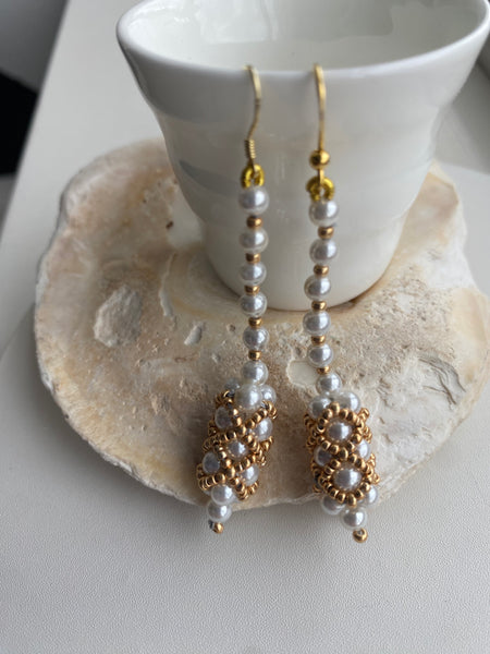 Handbeaded pearl and gold statement earrings