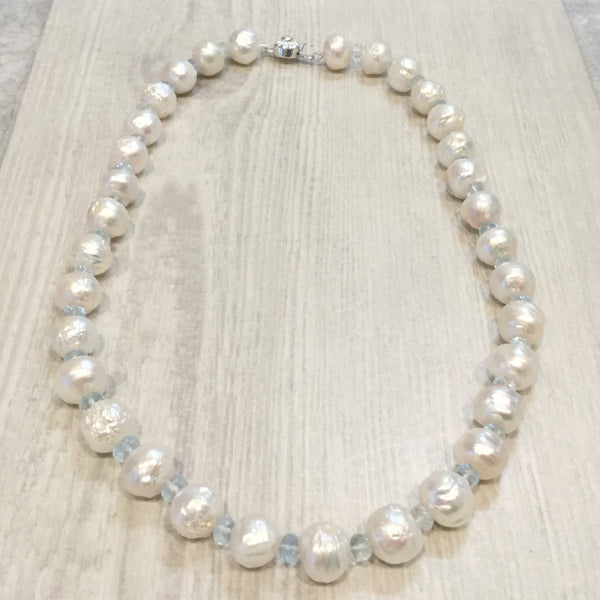 Ivory freshwater  pearl necklace with aquamarine