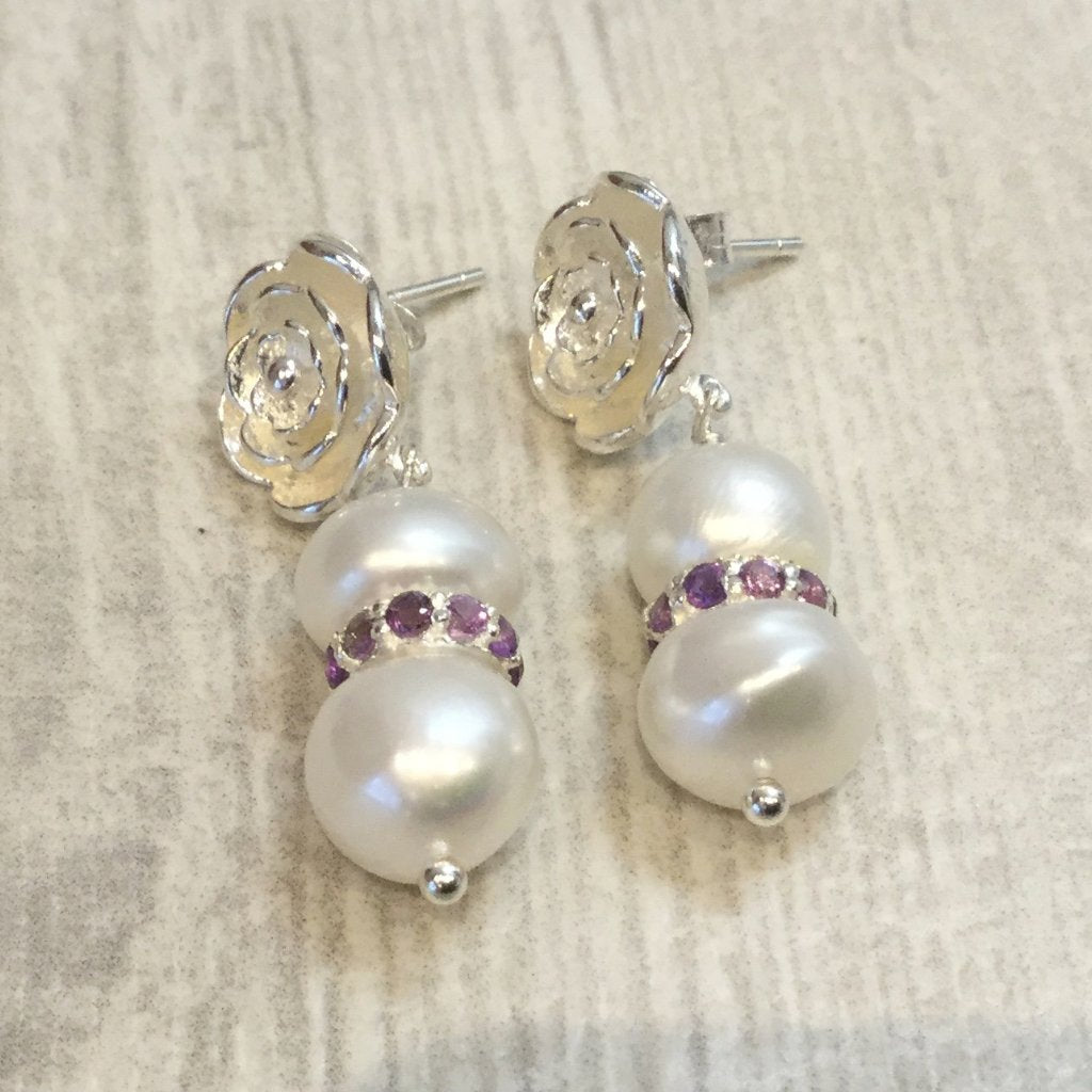 Ivory freshwater cultured button pearl earrings with amethyst