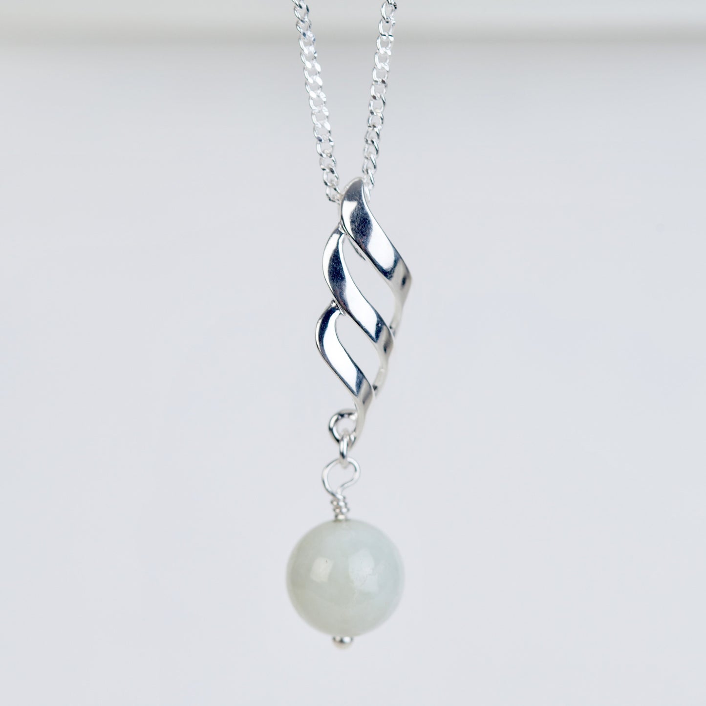 Jadeite and sterling silver twisted pendant necklace