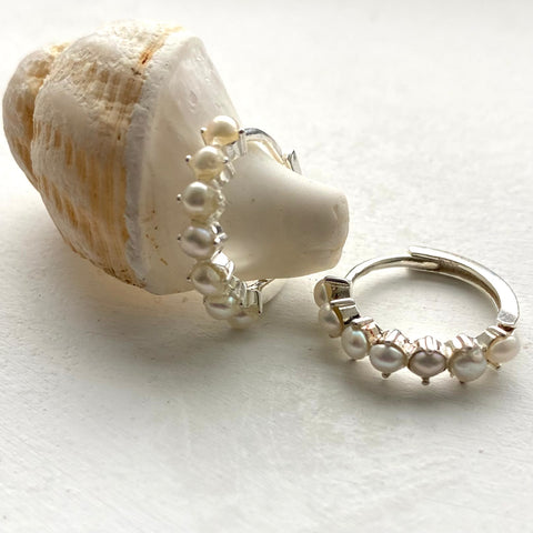 Pearl studded huggies earrings