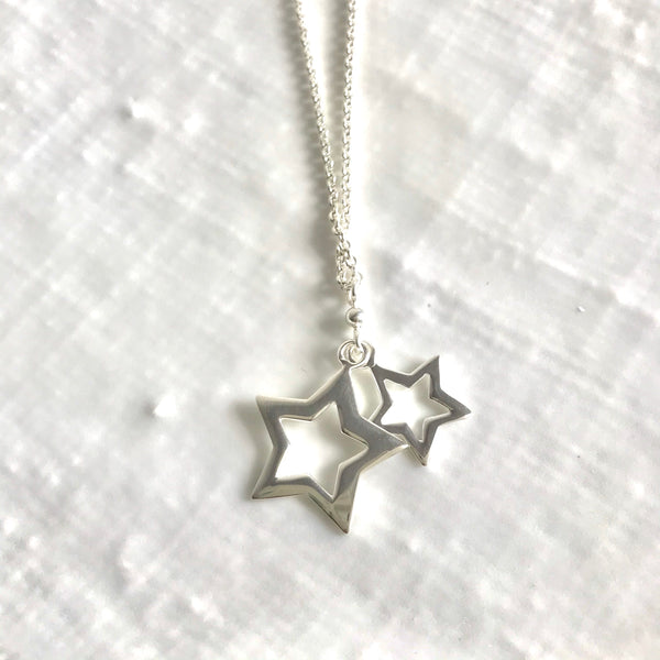 Double cut out sterling silver stars necklace