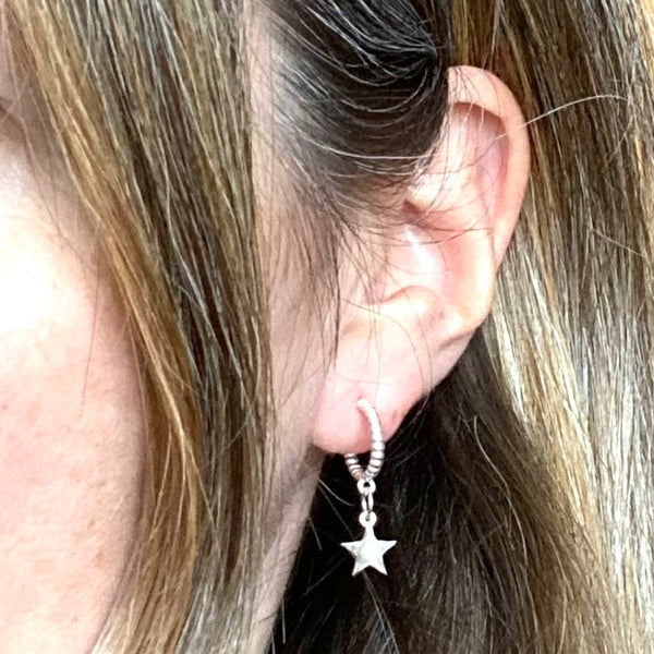 Huggie mini stars earrings