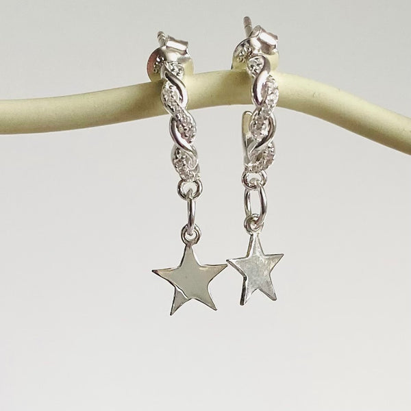 Huggie mini stars earrings