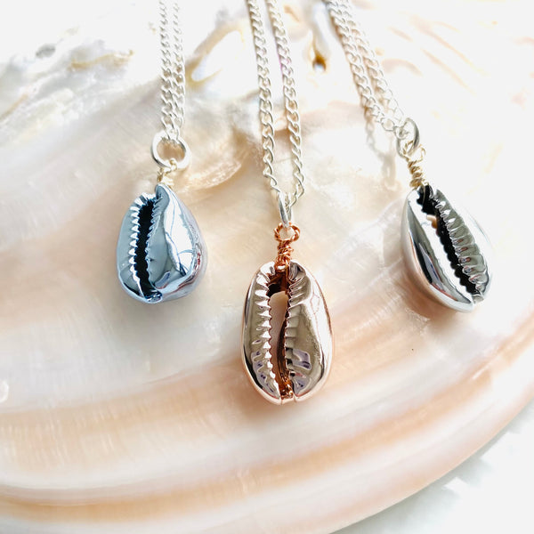 Cowrie shell pendant