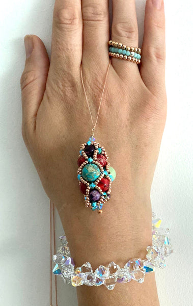 Renaissance style hand beaded pendants