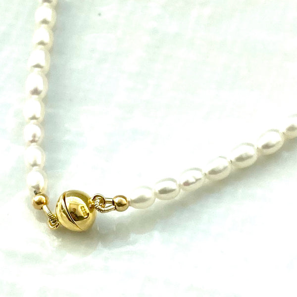 Rice pearl and gold necklace