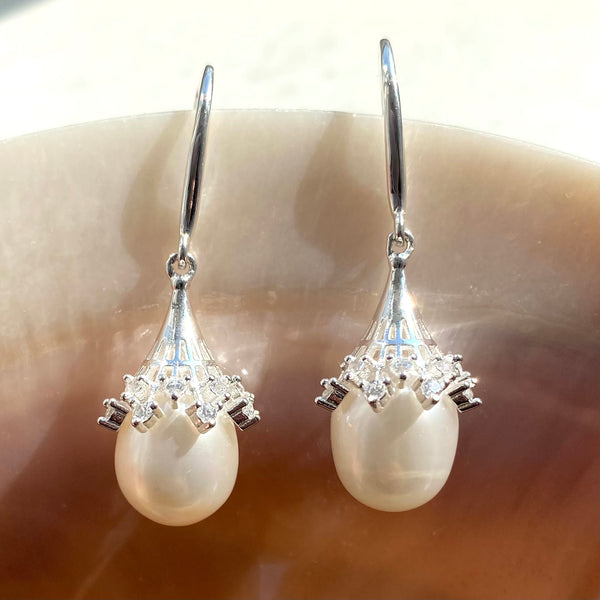 Pearl and silver statement earrings